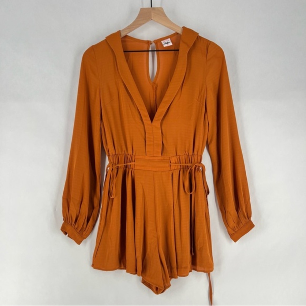 Leslie Selfie Orange Crepe Chiffon Pleated Deep V Tie Waist Long Sleeve Romper‎